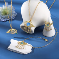Dainty Evil Eye Hamsa Bracelet