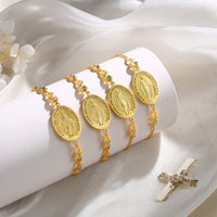 Gold Birthstone Medal and Cross Bracelet